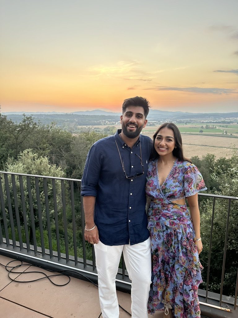 Aman and Ashmeet on a terrace at sunset
